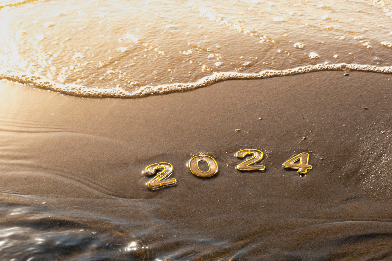 Happy New Year Background. 2024 Numbers On Beach And Sea Wave