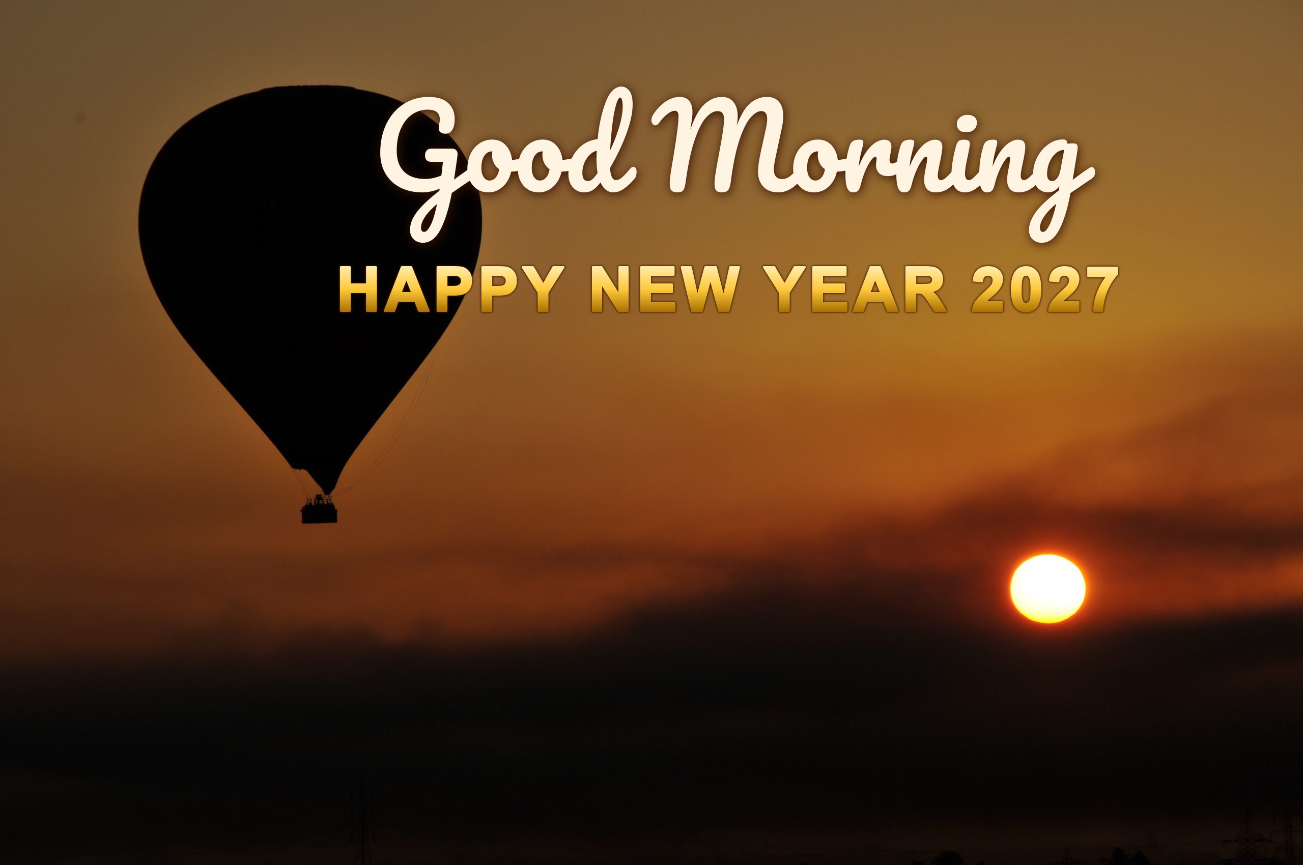 Good Morning Happy New Year 2027 over a hot air balloon silhouette at sunrise in Luxor